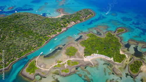 Aerial drone photo of exotic beaches with sapphire and turquoise clear waters, called the "Seychelles" of Greece, Lihadonisia island complex, North Evoia gulf, Greece
