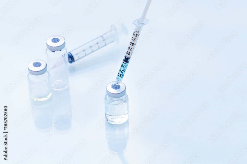 Vaccine with syringe Vaccine with syringe