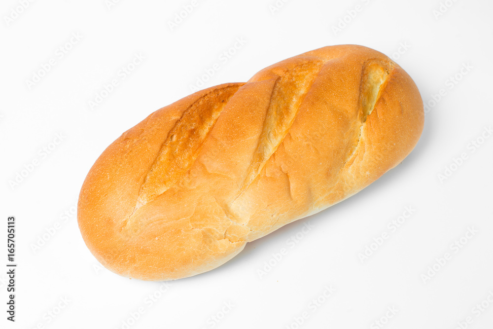 A loaf with a toasted crust on a white background. Isolate.
