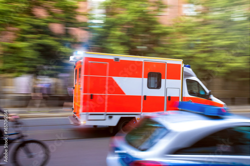 ambulance car speeding on city streets