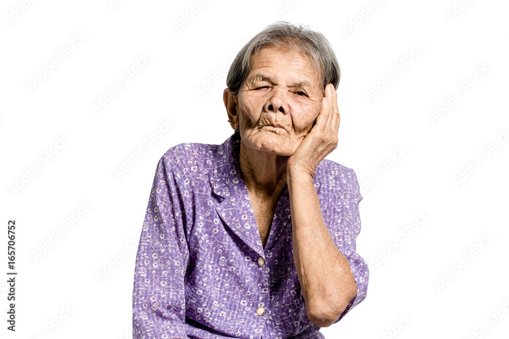 Portrait of a senior woman having headache with vintage costume. Isolated on white background with clipping path Portrait of a senior woman having headache with vintage costume. Isolated on white background with clipping path