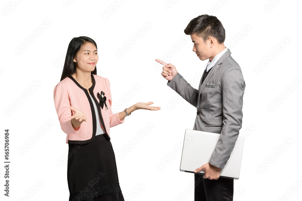 Portrait of two colleagues. Young furious man yelling at annoyed stressed woman with pointed finger. Isolated on white background with copy space and clipping path Portrait of two colleagues. Young furious man yelling at annoyed stressed woman with pointed finger. Isolated on white background with copy space and clipping path