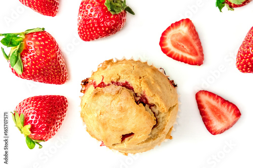 Fototapeta Naklejka Na Ścianę i Meble -  Strawberry muffin closeup with fresh berries and copyspace