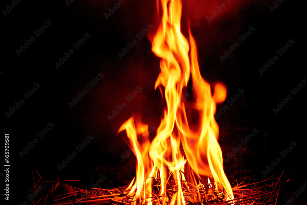 fire flame on dark background.Beautiful yellow, orange blaze fire flame texture style. fire flame on dark background.Beautiful yellow, orange blaze fire flame texture style.