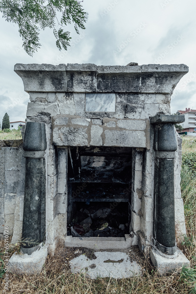 Entrance to an old family-owned mausoleum, a crypt on an abandoned ...