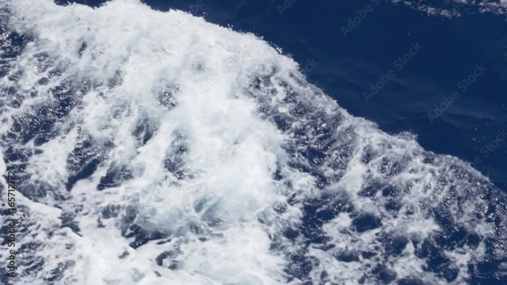 An extreme slow motion close up shot of rippling ocean waves. Shot at 144fps. An extreme slow motion close up shot of rippling ocean waves. Shot at 144fps.