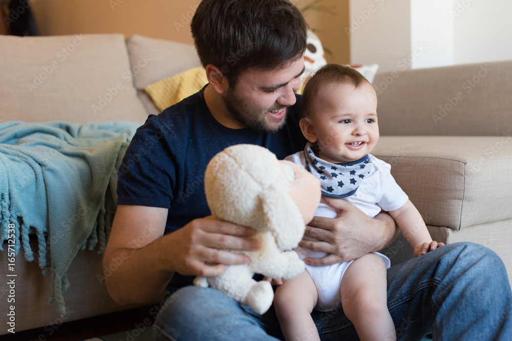 Father playing with baby Father playing with baby