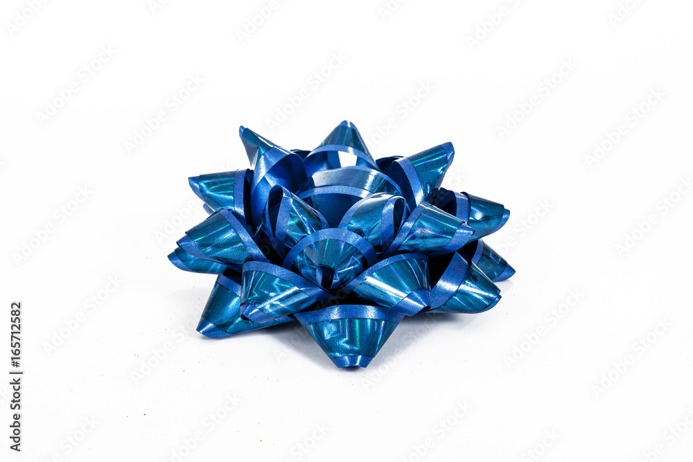 Blue bow closeup texture studio photo. Blue bow closeup texture studio photo.