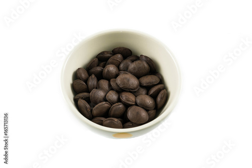 Sacha inchi peanut seed  in a cup on white background.