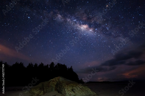 Starry night sky with milky way. Image contain visible noise due to high iso. soft focus due to wide aperture and long expose. © udoikel09