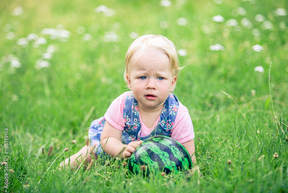 little girl smiling in a park little girl smiling in a park