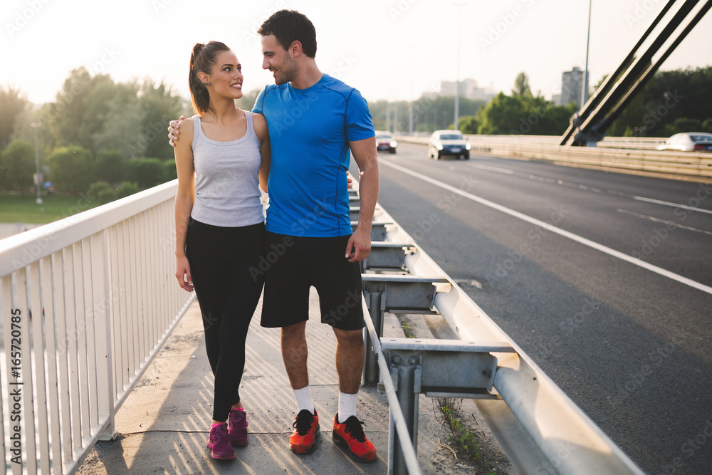 Obraz premium Beautiful sporty couple bonding after running