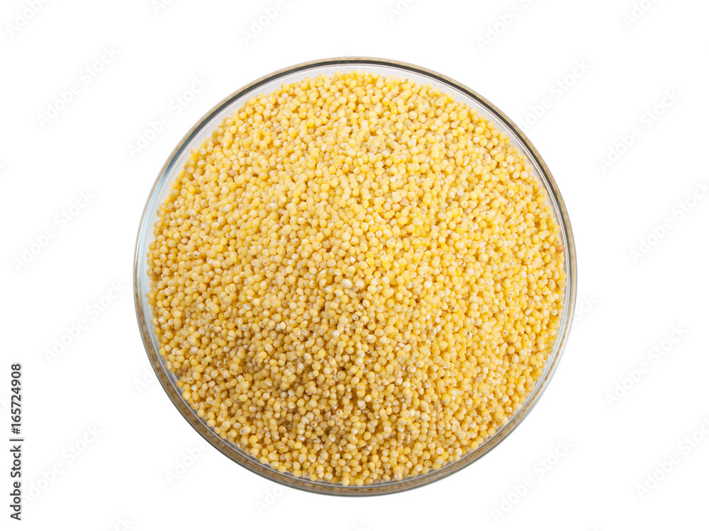 Bowl full of millet on white background top view Bowl full of millet on white background top view