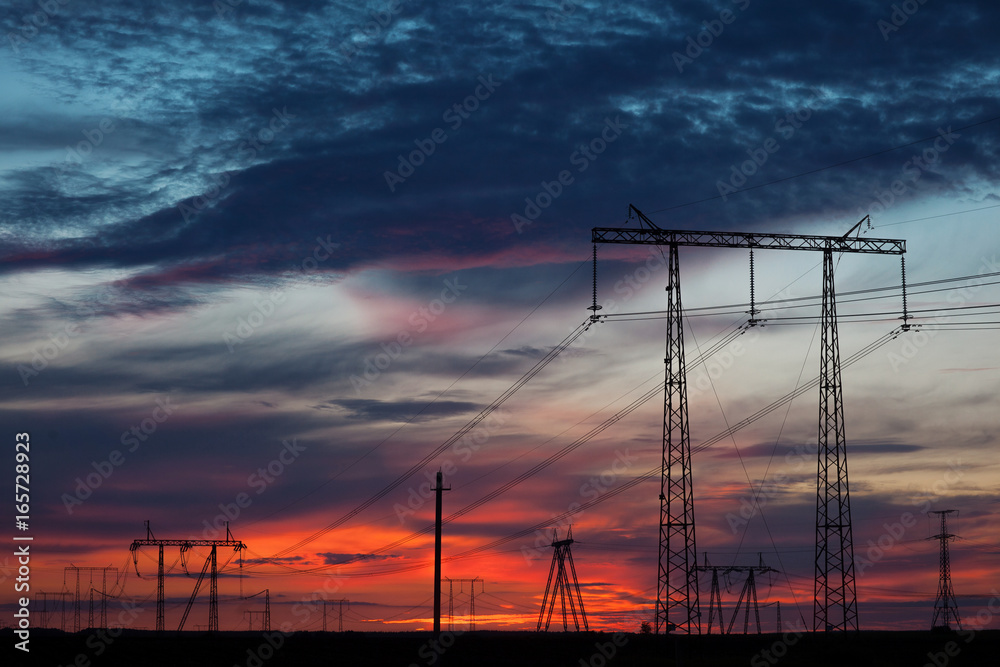 High-voltage line at sunset