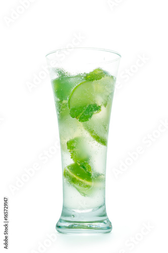 Mojito cocktail in wet misted glass. Green drink, lime, ice, foam and bubbles with clipping path