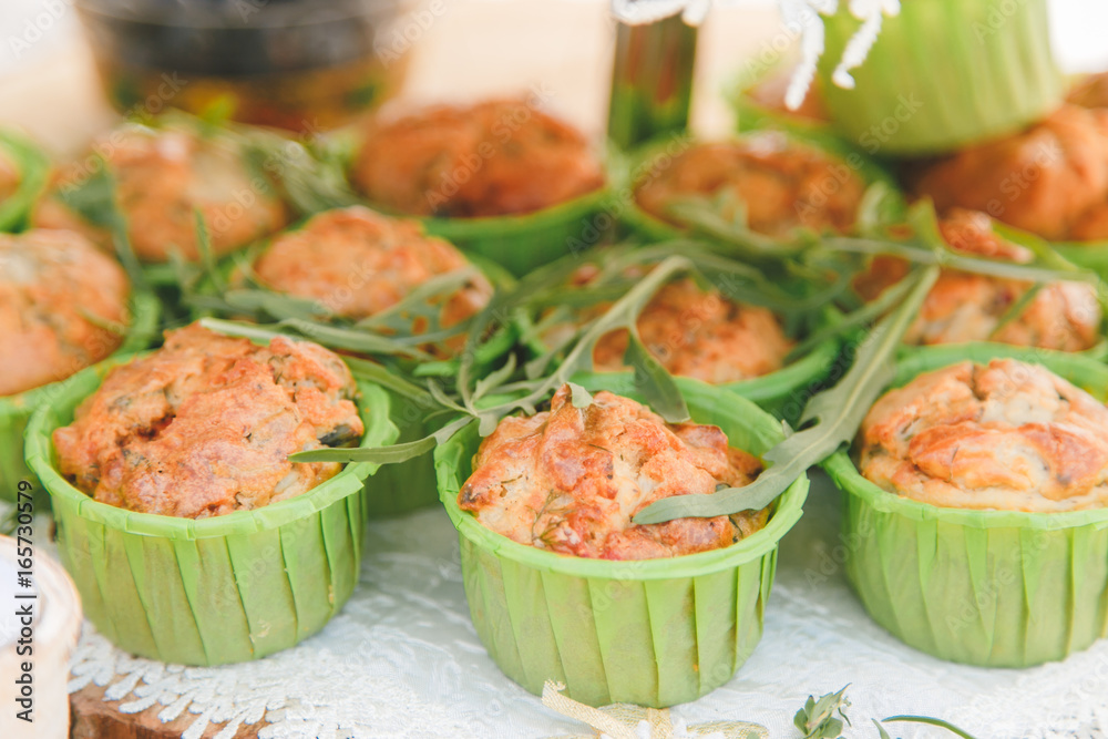 Snack of cheese cake with greens in small cupcake form. Snack of cheese cake with greens in small cupcake form.