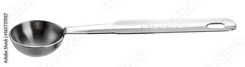 Metal measuring spoon teaspoon. Isolated on white background.