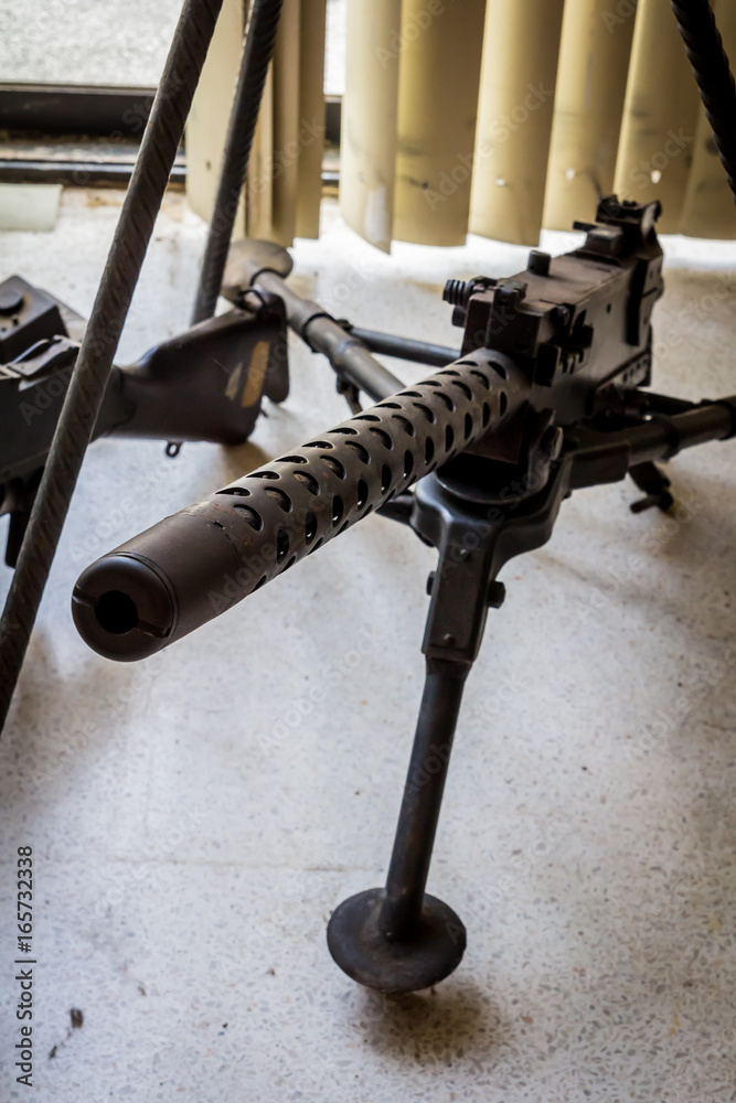 Fototapeta premium Old-fashioned war machine gun 
