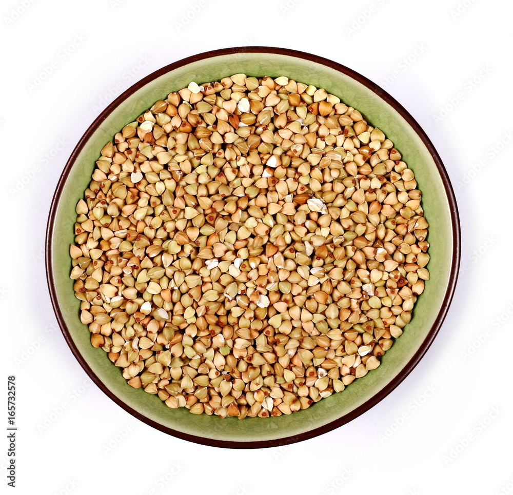 Buckwheat in bowl isolated on white background, with top view
Buckwheat in bowl isolated on white background, with top view
