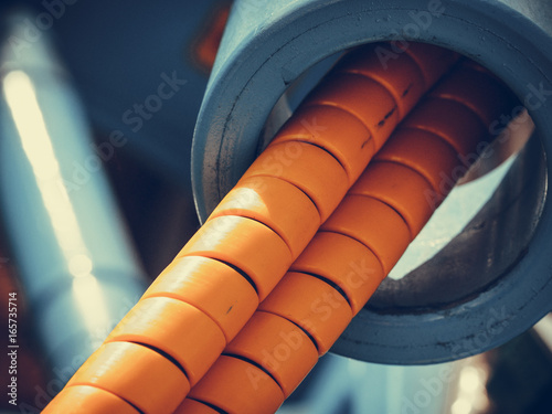 Tube wires in orange rubber cover casing