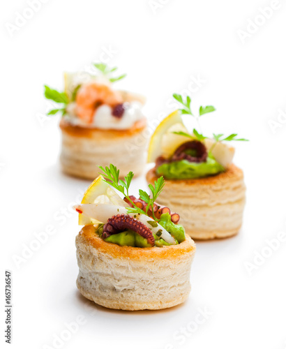 Fotografiet Vol-au-vents  puff pastry cases filled with salted squid and octopus