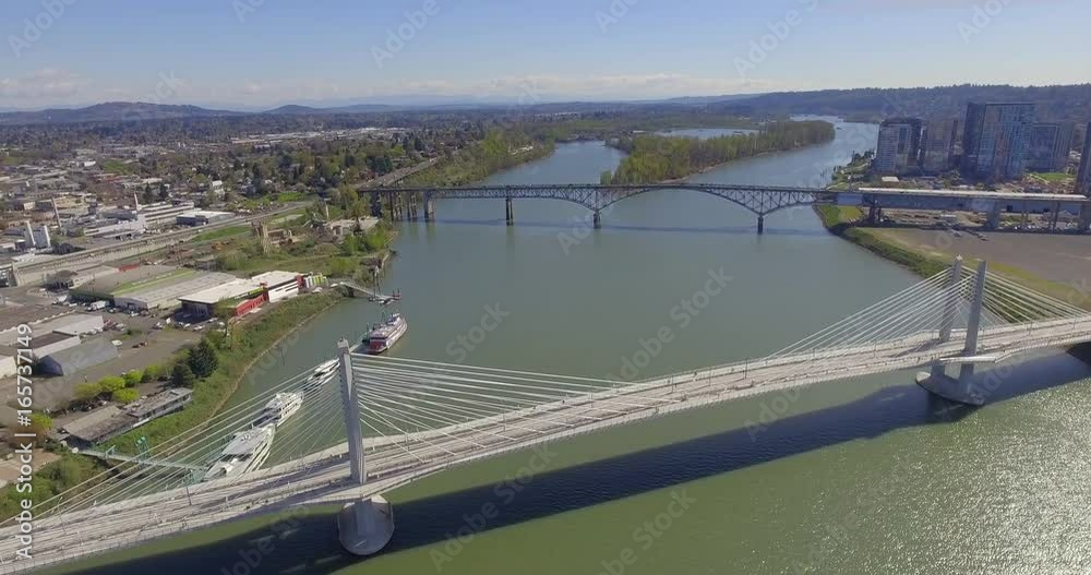 Tilikum Crossing Bridge of the People cable-stayed bridge across Willamette River in Portland Oregon Aerial Shot in 4K