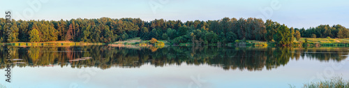 Evening summer lake panorama.