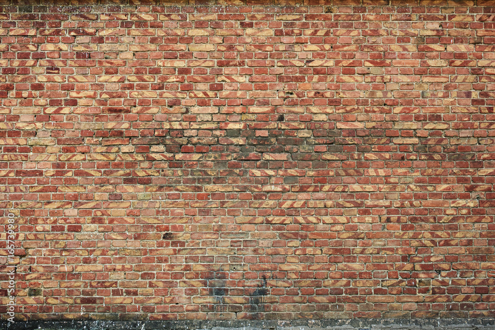 old brick wall for texture or background, brown and red color old brick wall for texture or background, brown and red color