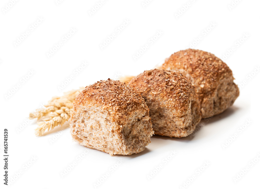 Mini buns and wheat ears isolated on white background Mini buns and wheat ears isolated on white background