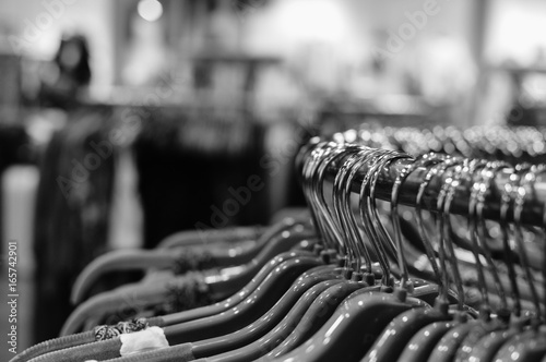 Closeup on clothing hangers, abstract background