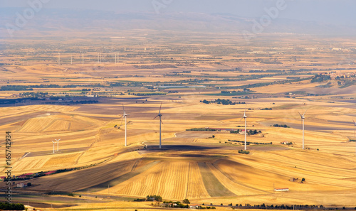 Tavoliere delle Puglie yellow plain with wind turbines as seen in Gargano - Apulia - Italy