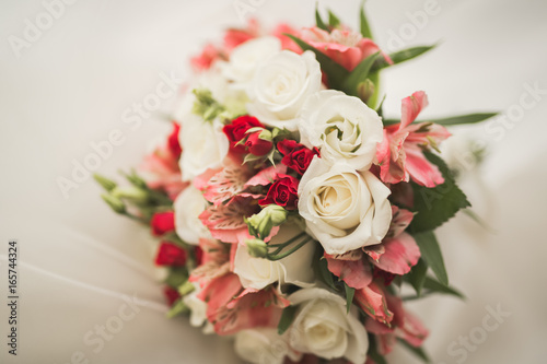 Wonderful luxury wedding bouquet of different flowers