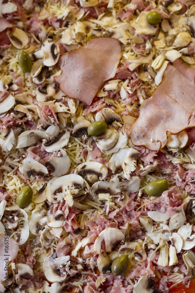 Tasty pizza texture from above Tasty pizza texture from above