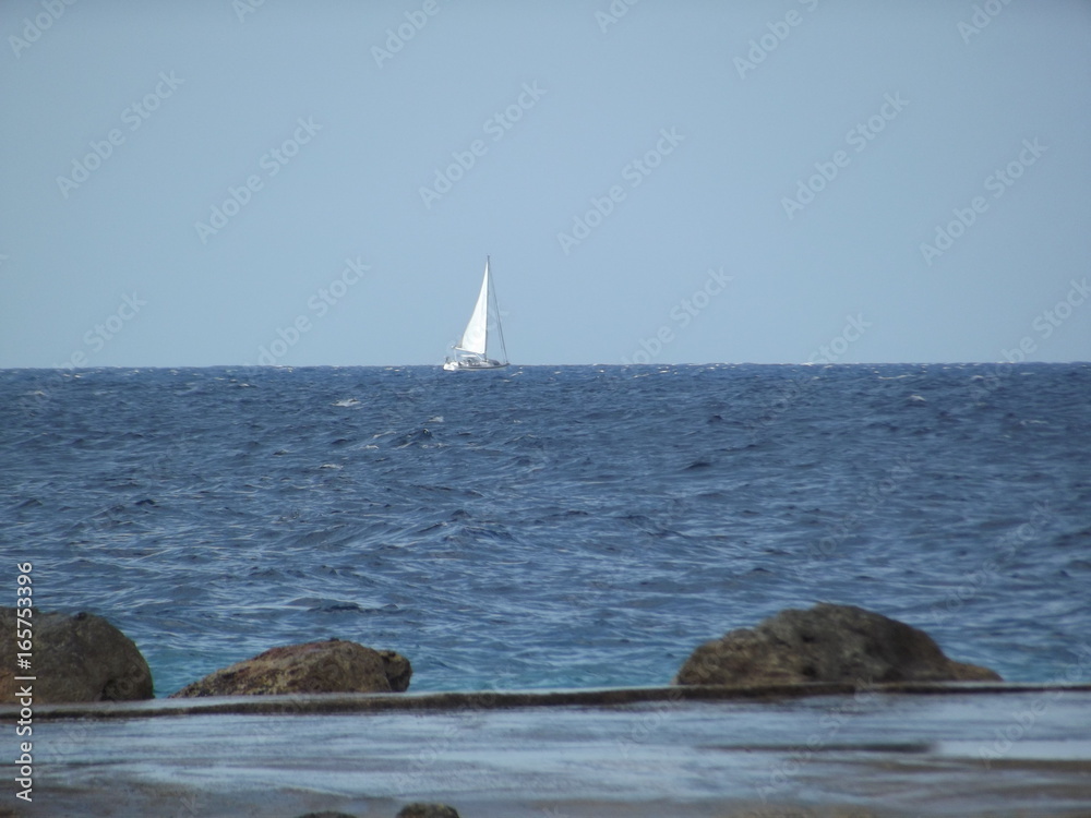Sailboat in horizon