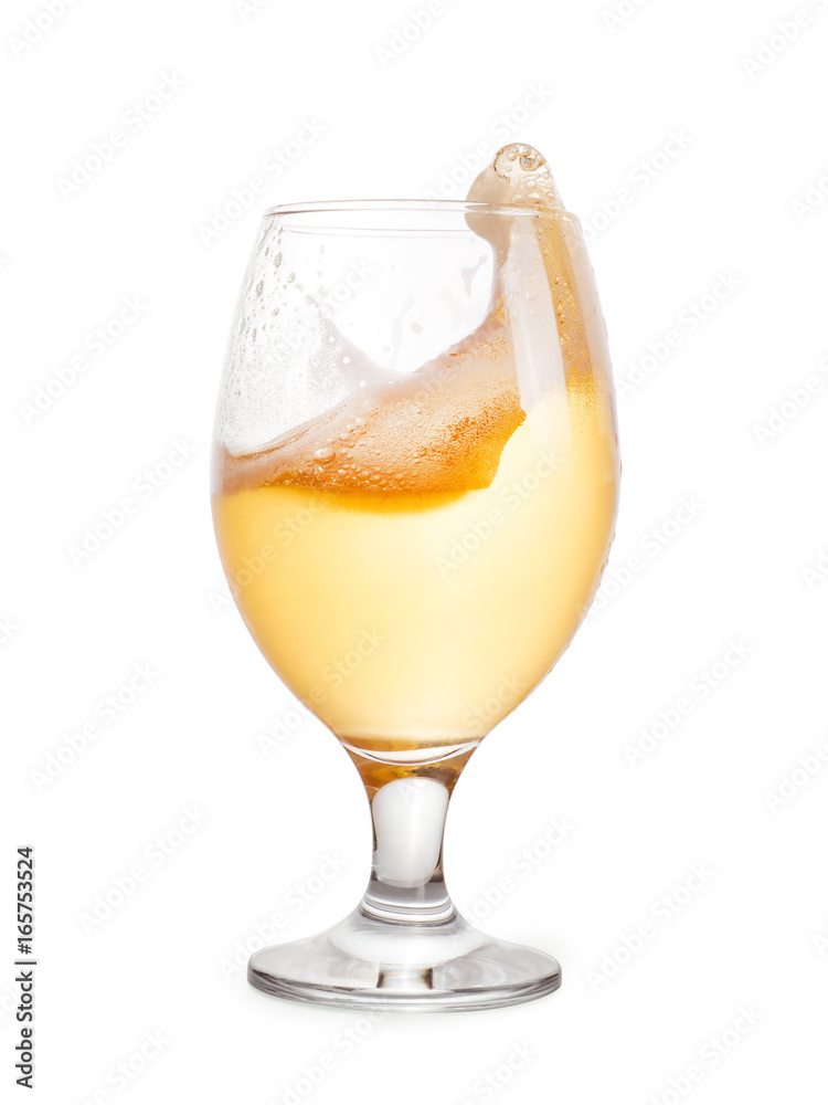 Splash of light beer into glass Splash of light beer into glass
