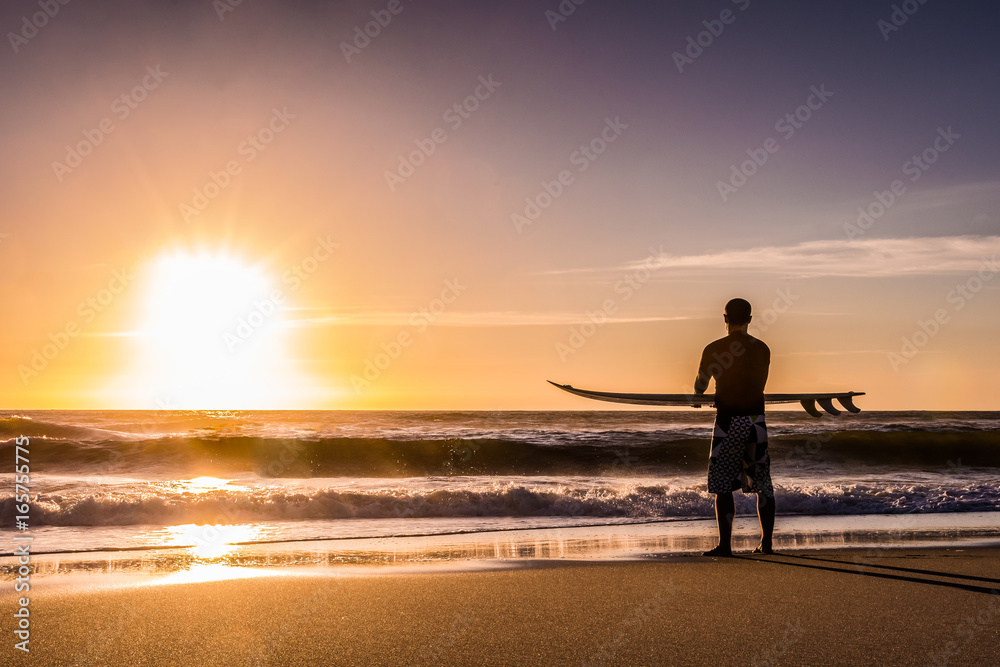 Surfer watching the waves