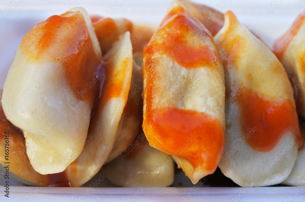 Close up of Chines dumpling inside takeaway bo Close up of Chines dumpling inside takeaway bo