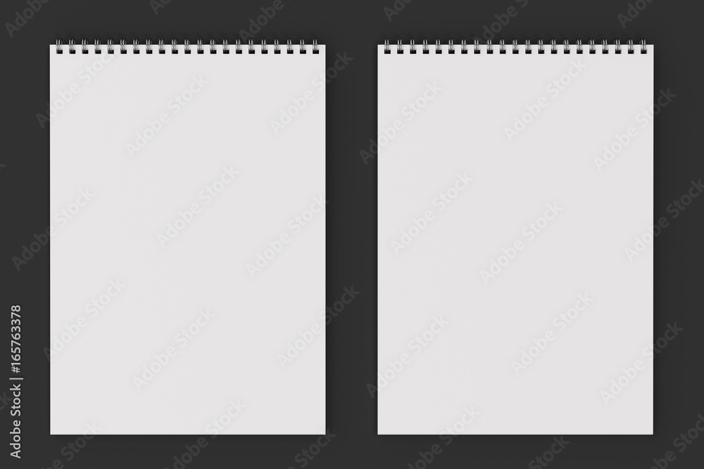 Blank white notebook with metal spiral bound on black background Blank white notebook with metal spiral bound on black background