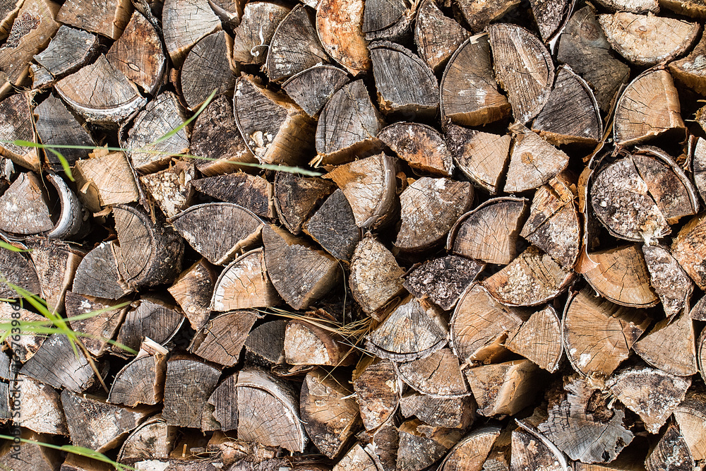 pile of old firewood for background. pile of old firewood for background.