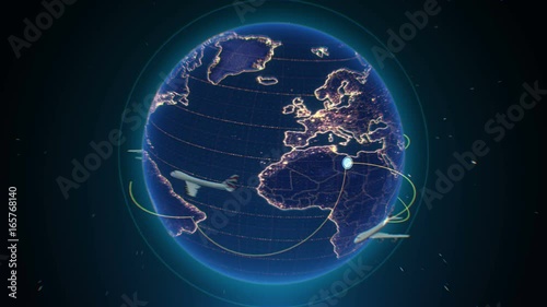 Computer animation of rotating Earth with airplanes flying around planet photo