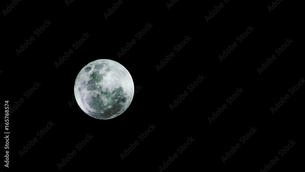 Obraz premium Full Moon or Supermoon / The Full Moon is the moment the entire face of the Moon is illuminated by the Sun's rays. It is the 3rd primary phase