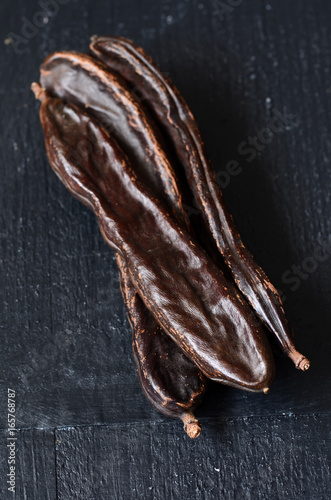 Ripe carob pods photo