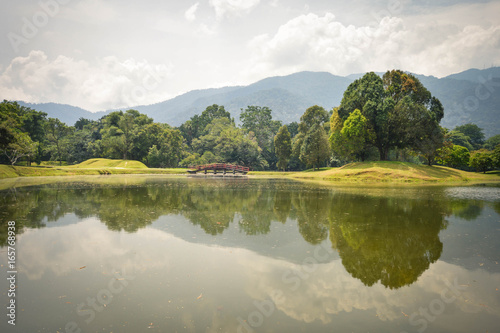 Beautiful landscape of water reflections in Taman Tasik, aka Lake Gardens, in the city of Taiping, Perak State, Malaysia photo