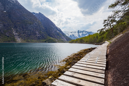 Wooden walking boards on a hiking trail in Norway © srekap