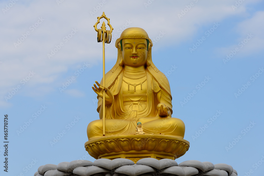Fototapeta premium Buddha statue at Haedong Yonggungsa Temple, Busan, South Korea