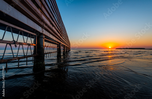 Fototapeta Naklejka Na Ścianę i Meble -  Bright colorful sunrise at sea