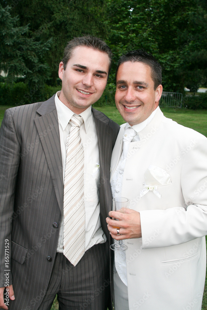 Portrait of very handsome gay male couple on their wedding day Portrait of very handsome gay male couple on their wedding day