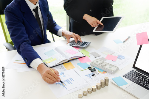 Audit concept,Bookkeeper Team or financial inspector and secretary making report Financial Planning Accounting Report in Spreadsheet . Internal Revenue Service inspector checking financial document.