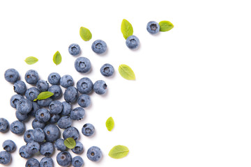Fresh blueberries and leaves, berry frame isolated on white background, top view