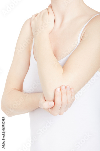 Elbow pain, woman in white shirt holding her arm isolated on white, clipping path